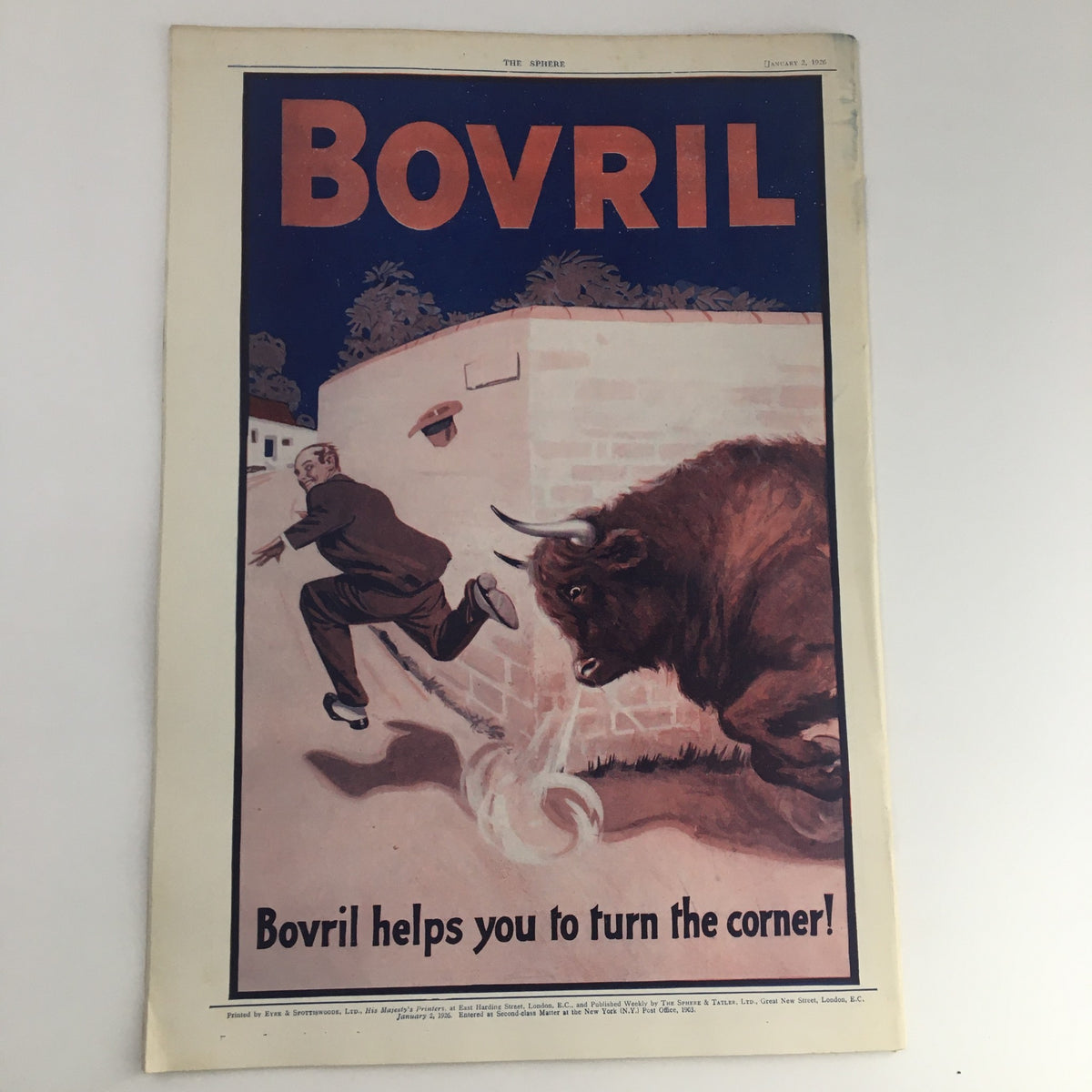 The Sphere Newspaper January 2 1926 advertisement for Bovril depicting a man running from a bull, showcasing vintage advertising art.