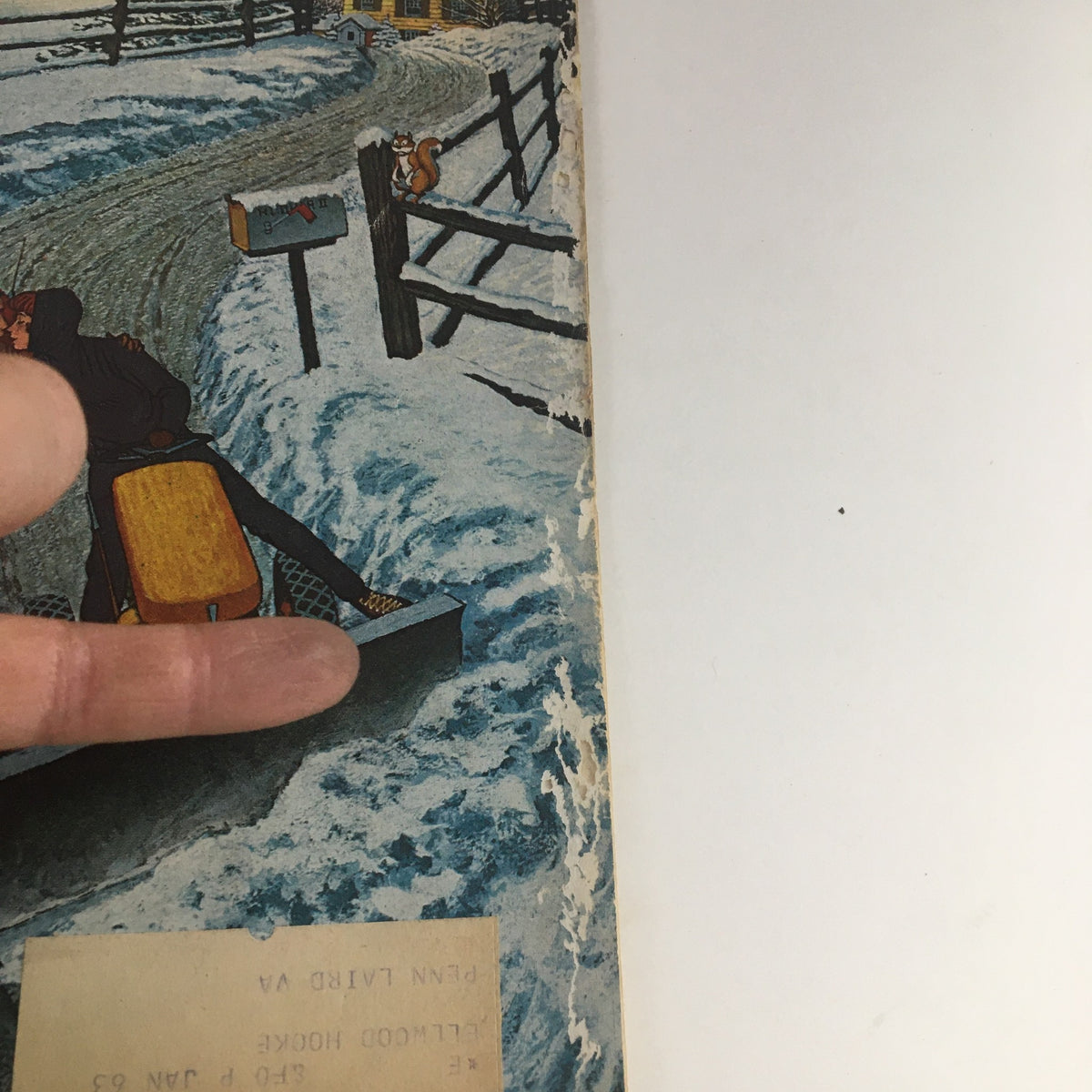 Detail of the cover from The Saturday Evening Post February 21, 1962, showcasing a person using a snowplow in a winter scene with a squirrel near a mailbox.