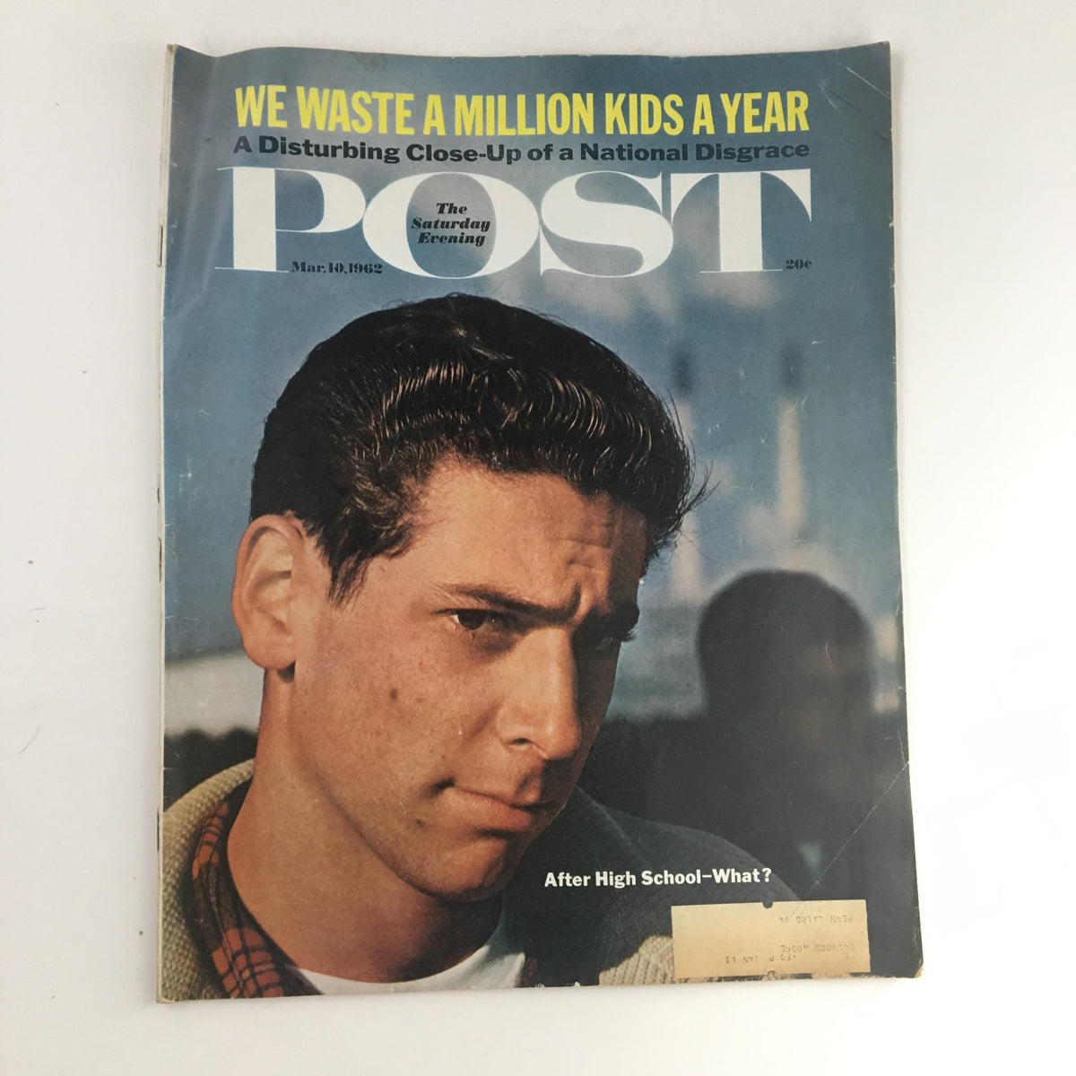Cover of The Saturday Evening Post March 10, 1962, featuring the headline 'We Waste A Million Kids A Year' alongside a close-up image of a young man with dark hair, reflecting on the social issues presented in this issue.