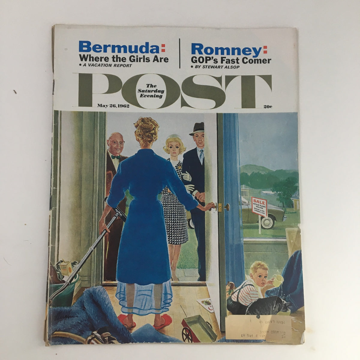 The Saturday Evening Post May 26 1962 cover featuring a vibrant illustration of a woman in a blue dress greeting guests at the door, depicting summer vacation vibes with references to Bermuda: Where The Girls Are and Romney: GOP's Fast Comers.