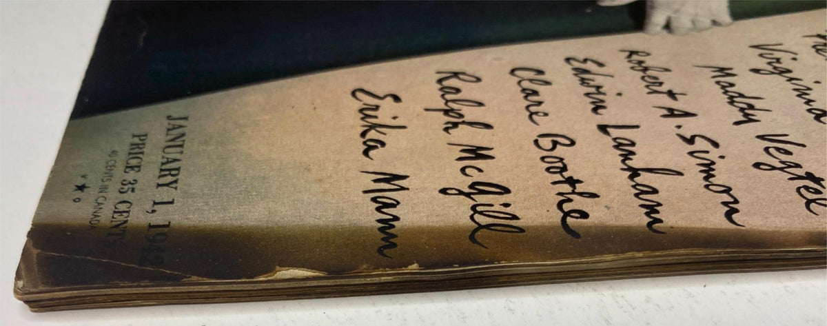 Detailed view of signatures on the side of Vogue Magazine January 1, 1942 Sandy Rice Cover by John Rawlings, featuring notable names linked to the edition, emphasizing its collectible nature.