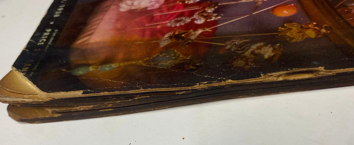 Detailed view of the vintage Vogue Magazine May 1, 1938 Cover by Anton Bruehl from a unique angle, showcasing the aged edges and spine.