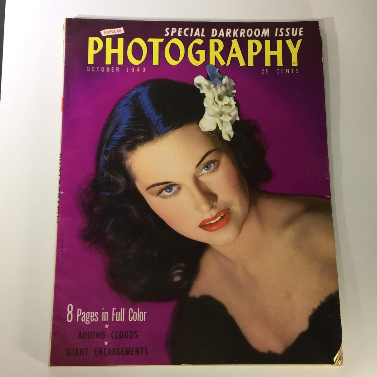 VTG Popular Photography Magazine October 1949 cover featuring model Lee Lampman with vibrant colors and a floral accent, showcasing the photography styles of the late 1940s.