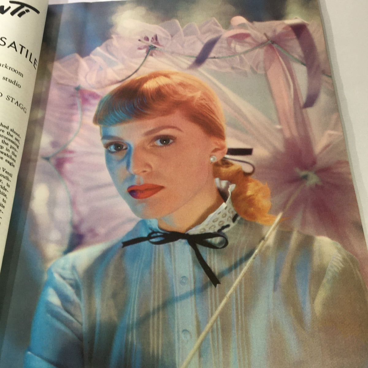 Stunning portrait from October 1949 Popular Photography Magazine, featuring a model styled by Tony Vent, showcasing vibrant colors and unique lighting.