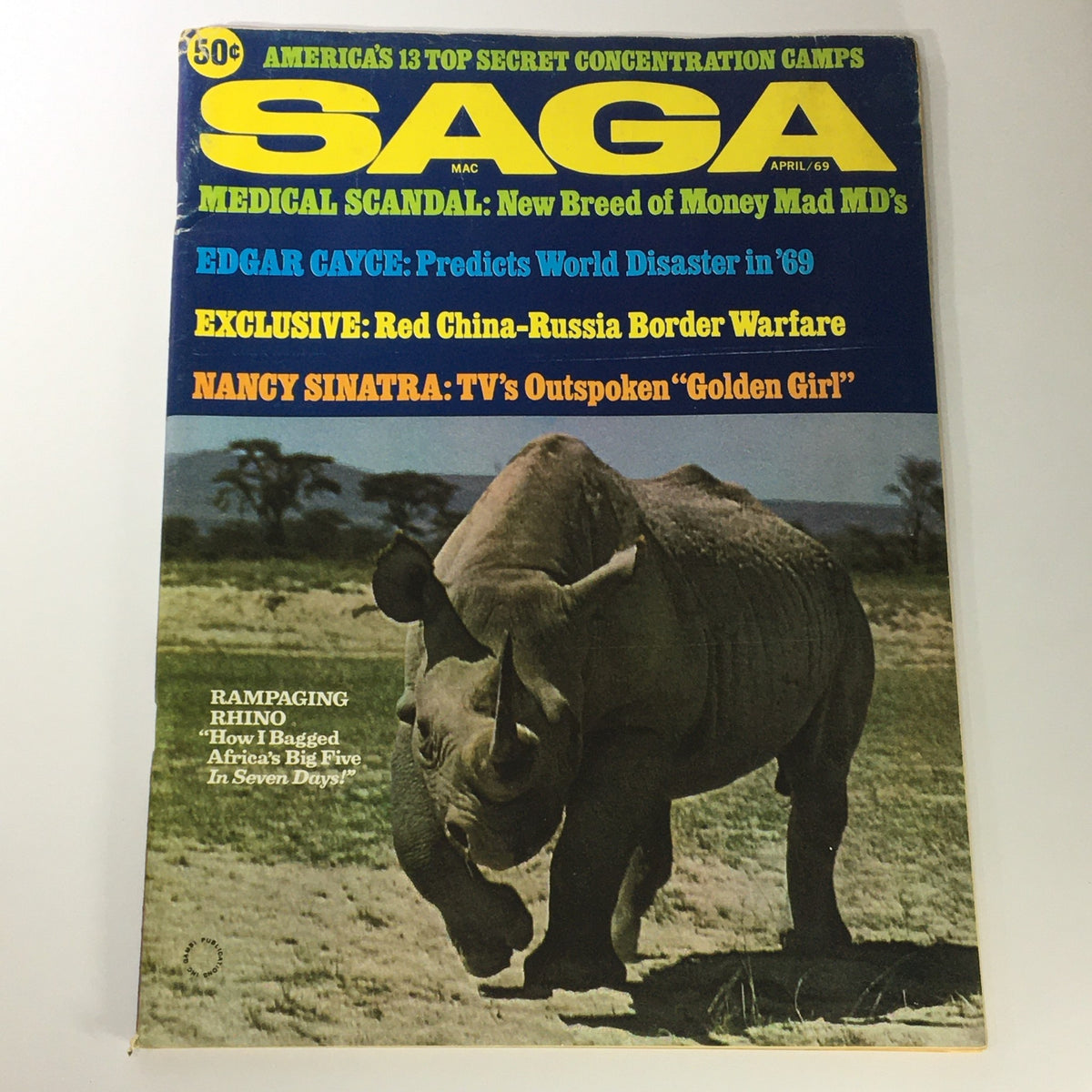 VTG Saga for Men Magazine April 1969 featuring articles on Edgar Cayce and Nancy Sinatra, with a dynamic cover image showcasing a rhino in a serene African landscape.