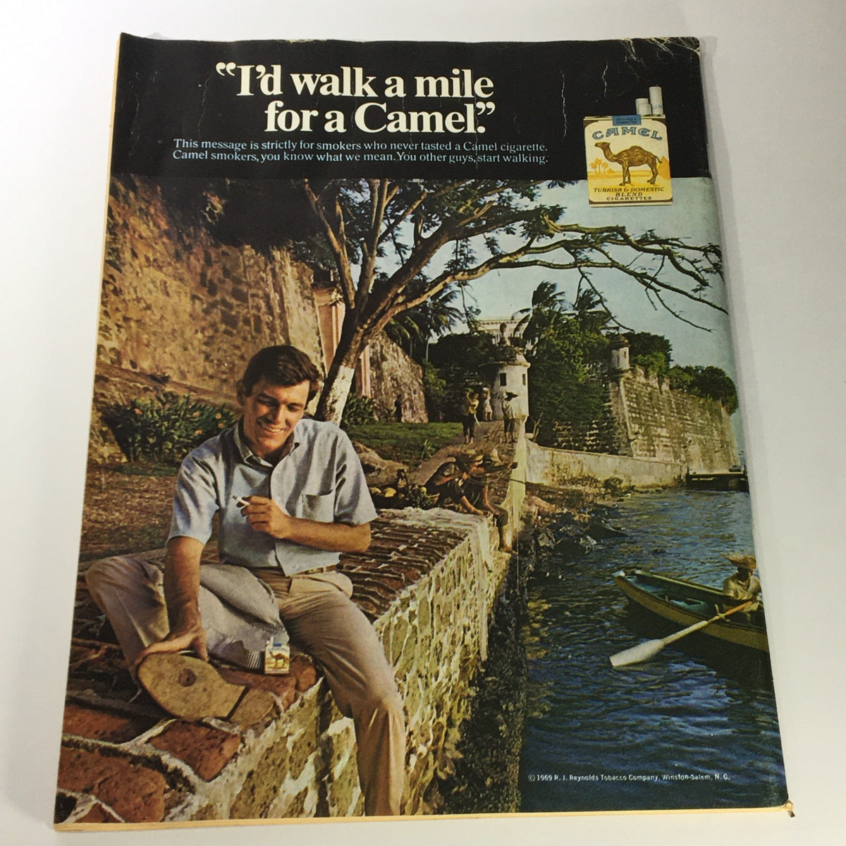 VTG Saga for Men Magazine April 1969 cover featuring a man with a Camel cigarette, reflecting the 1960s lifestyle and advertising culture.