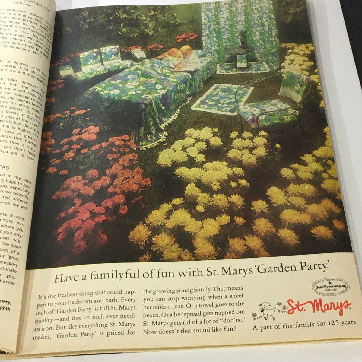 Colorful advertisement for St. Mary's 'Garden Party' bedding from the June 1969 VTG Good Housekeeping Magazine, featuring children enjoying the vibrant floral decor.