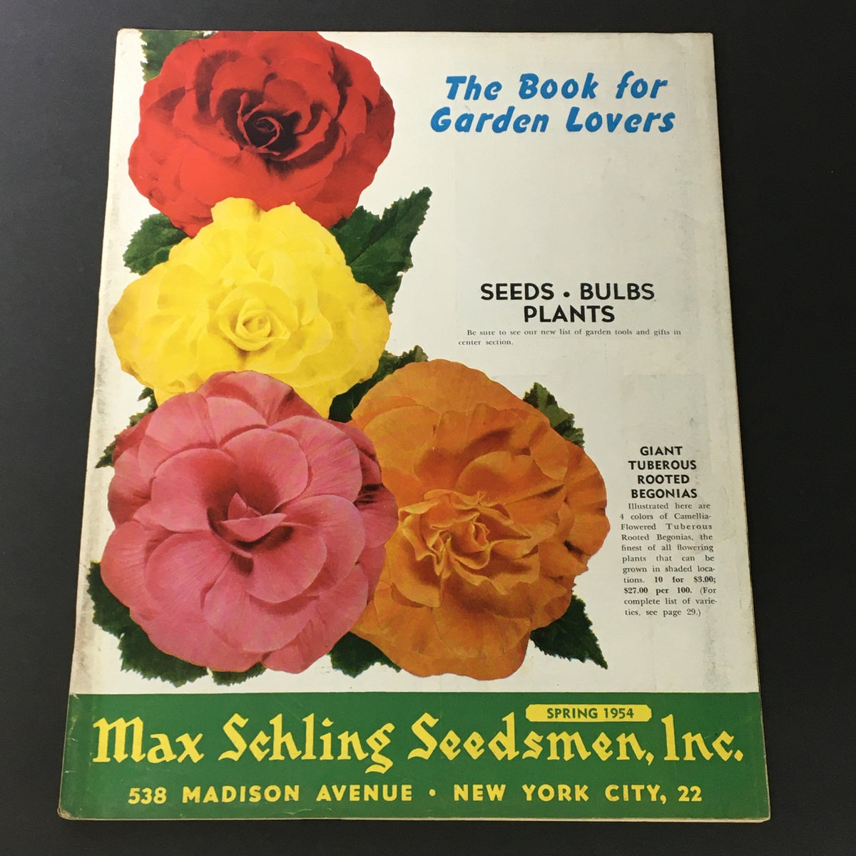 Cover of 'The Book for Garden Lovers Spring 1954' by Max Schling Seedmen Incorporation featuring vibrant roses in red, yellow, and orange.