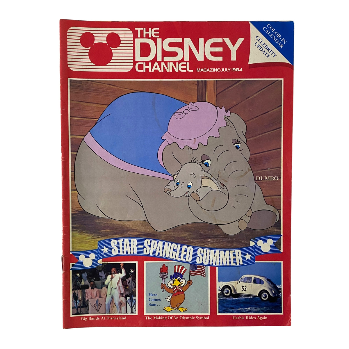 Cover of The Disney Channel Magazine July 1984 featuring Dumbo, showcasing articles about Big Bands at Disneyland, and summer programming highlights, in very good condition.