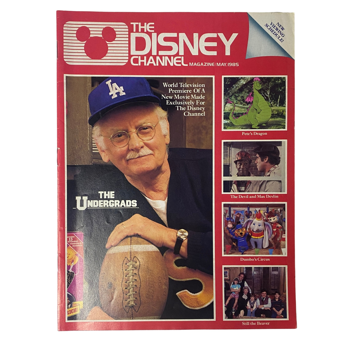 Cover of The Disney Channel Magazine May 1985 featuring The Undergrads and Pete's Dragon, showcasing Art Carney, surrounded by images from classic Disney Channel programs.
