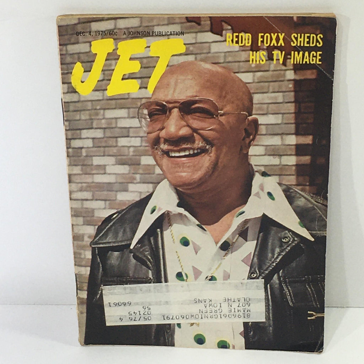 Cover of Jet Magazine from December 4, 1975, featuring Redd Foxx with a smile, shedding his TV image. The cover highlights his transition from television with a vibrant photo and bold text.
