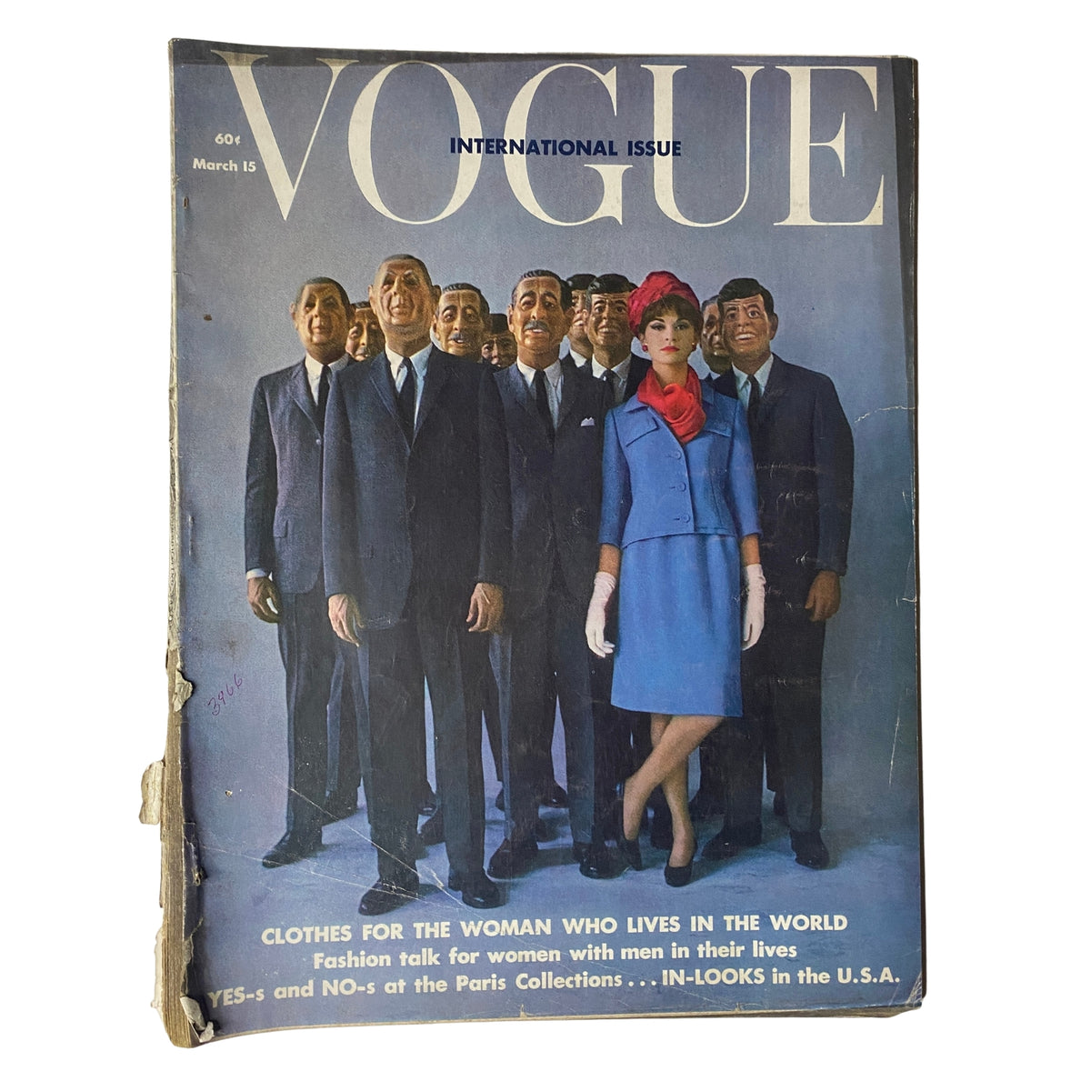 Vogue Magazine March 15, 1962 featuring Gillis McGil on the cover, captured by Art Kane. The cover showcases a group of well-dressed men alongside a fashionably attired woman in a blue outfit, embodying early 1960s elegance and cosmopolitan style.