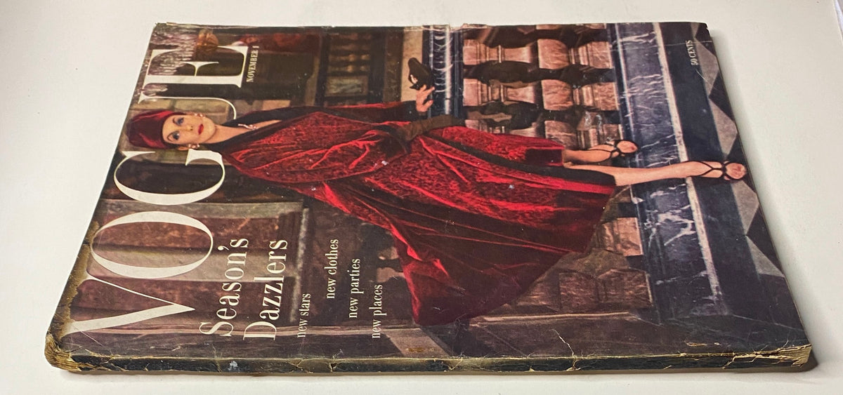 Another view of the vintage Vogue Magazine cover from November 1, 1955 depicting Anne St. Marie showcasing the season's fashion dazzlers with elegant styling.