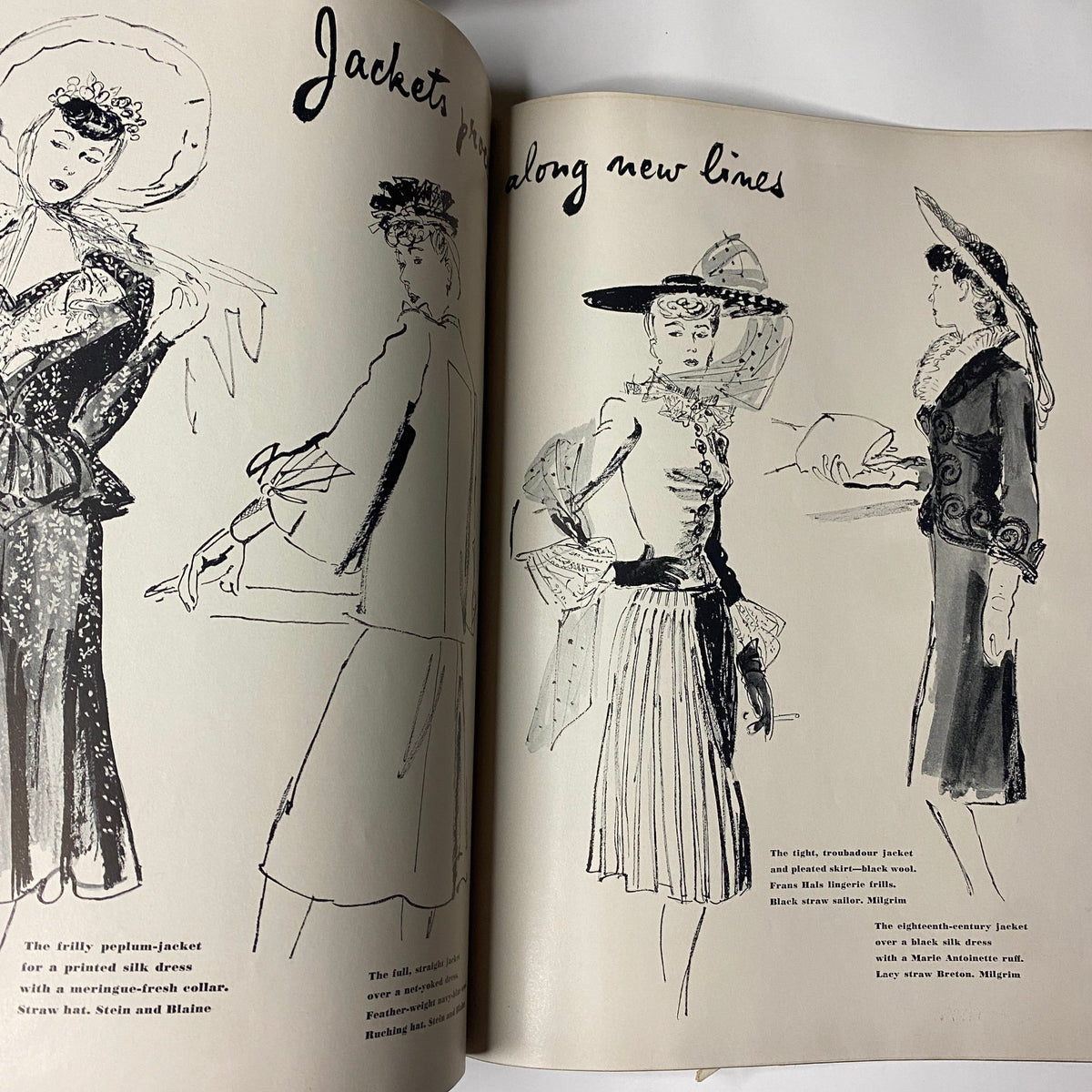 Fashion illustrations in Vogue Magazine April 15, 1941 displaying new jacket designs with detailed descriptions.
