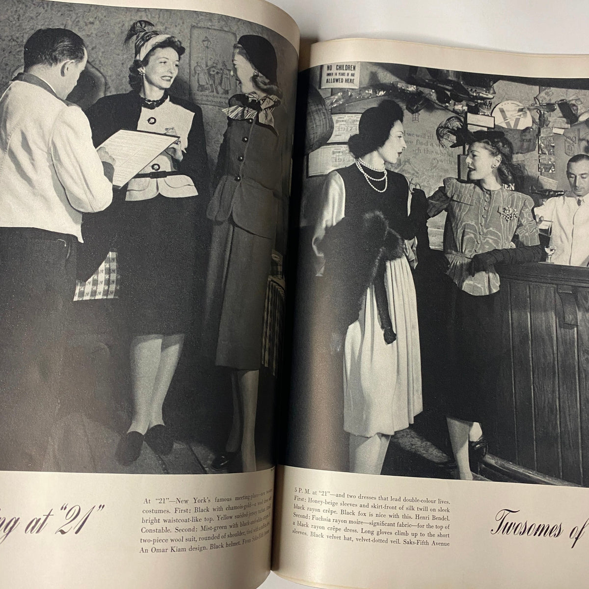 Vogue Magazine November 1, 1941 celebrating fashion at '21', featuring women in stylish outfits from the early 1940s, capturing the spirit of the era and the magazine's editorial style.
