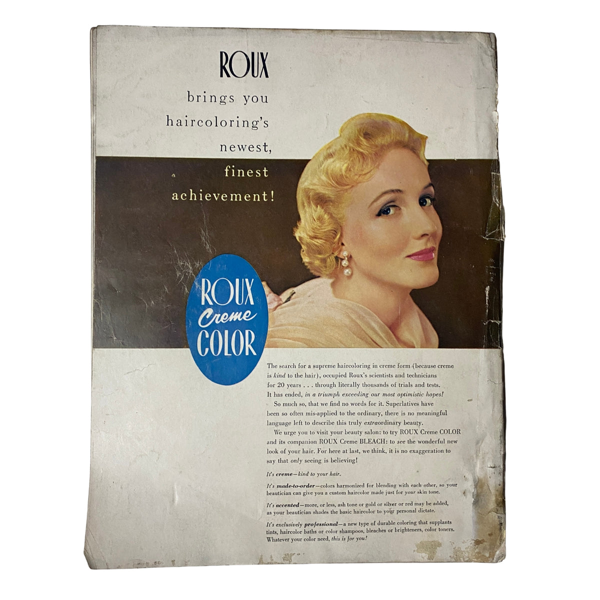 Back cover of Vogue Magazine September 1, 1954 featuring a vintage advertisement for Roux hair coloring, showcasing a woman with elegant blonde curls and promoting 'Roux Creme Color' as the finest achievement in hair coloring.