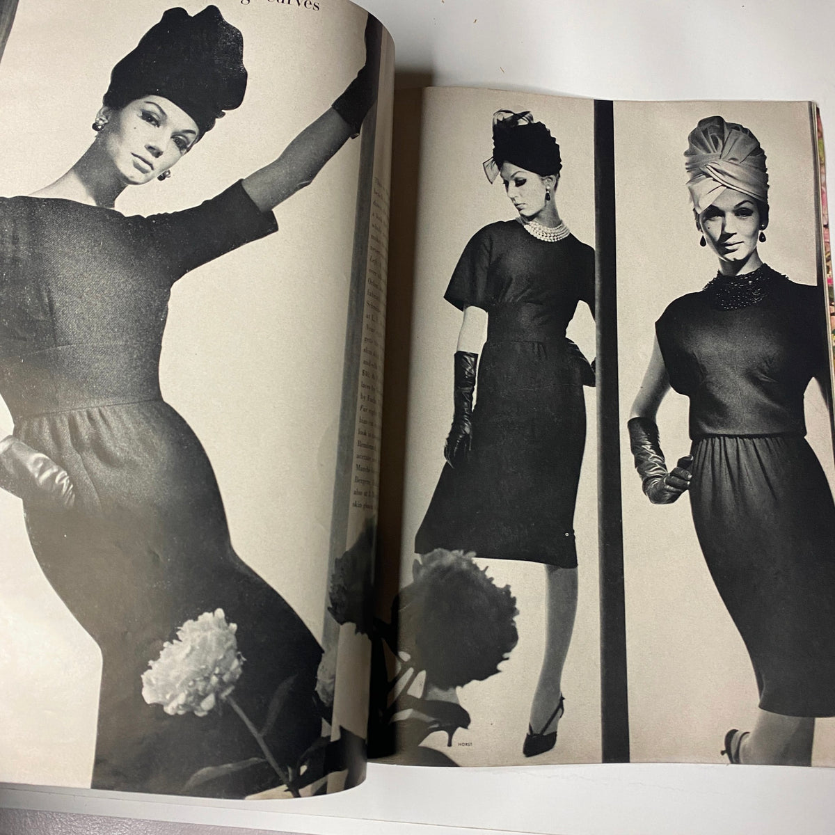 Fashion editorial page from Vogue Magazine July 1962 displaying elegant models in summer dresses, enhancing the glamour of mid-century fashion.