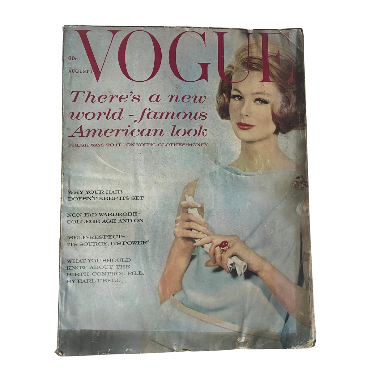 Vogue Magazine August 1, 1961 cover featuring Monique Chevallier, showcasing early 1960s fashion and elegance.