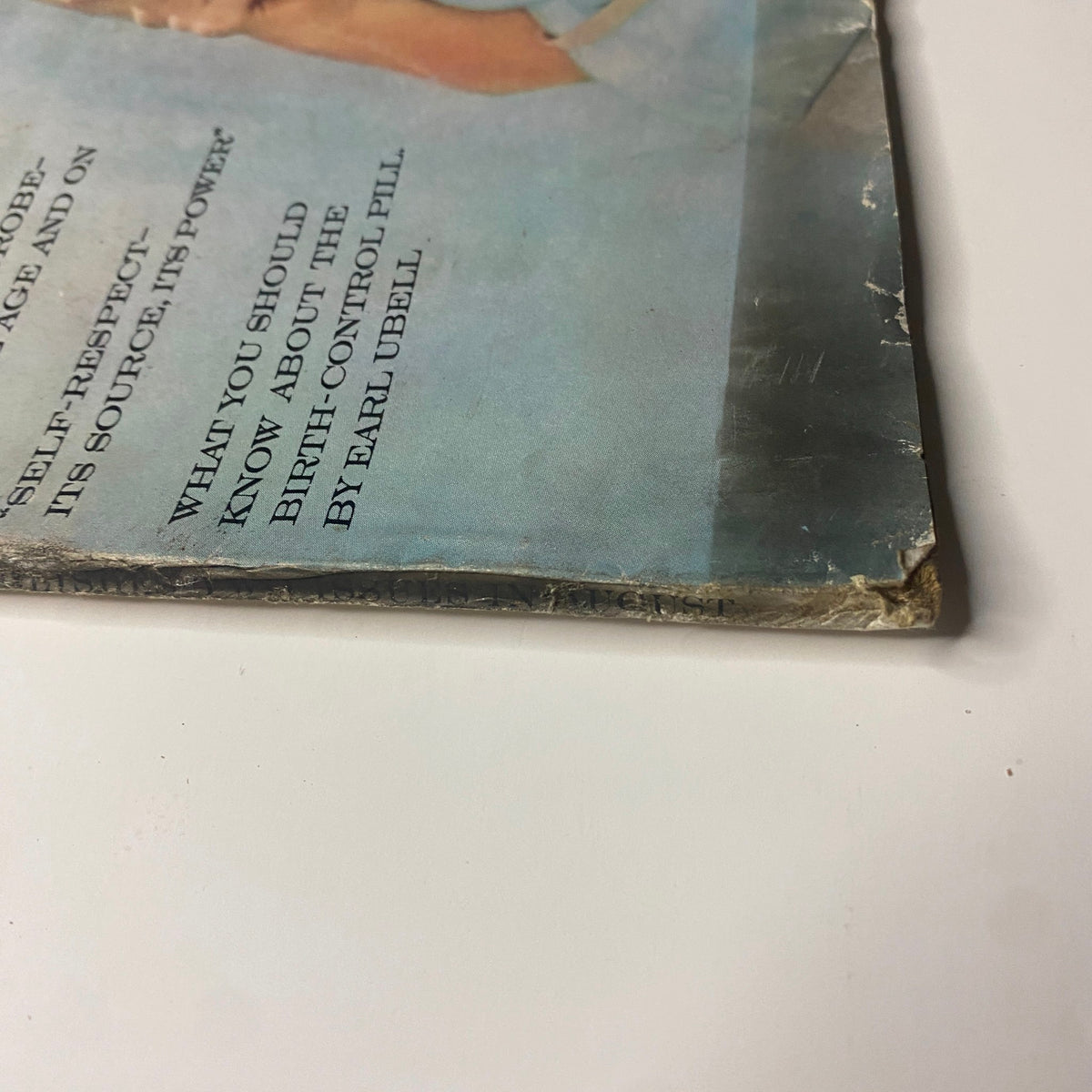 Detail of the lower corner of Vogue Magazine August 1, 1961, illustrating the history and condition of this collectible issue.