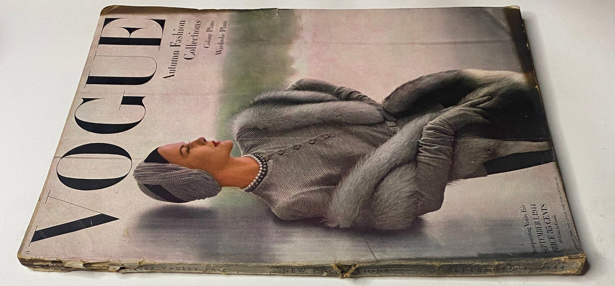 Cover of Vogue Magazine September 1, 1944, featuring Selene Mahri, photographed by John Rawlings. The vintage magazine shows signs of wear, encapsulating mid-century fashion.