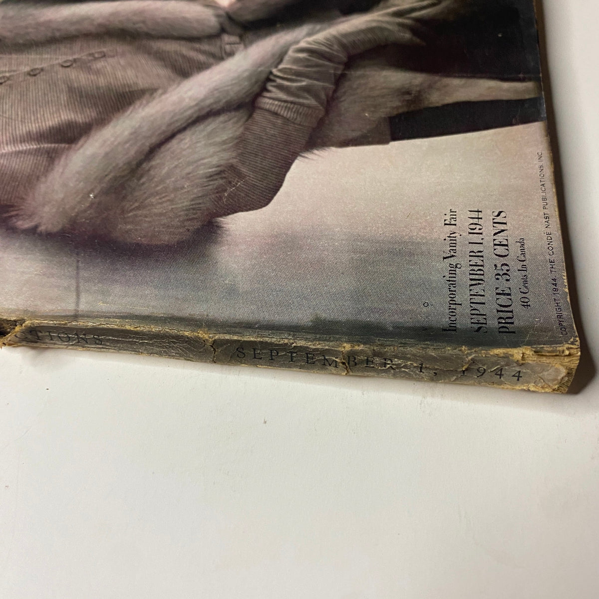 Spine view of Vogue Magazine September 1, 1944, showcasing the publication date and condition. The cover features Selene Mahri, photographed by John Rawlings.