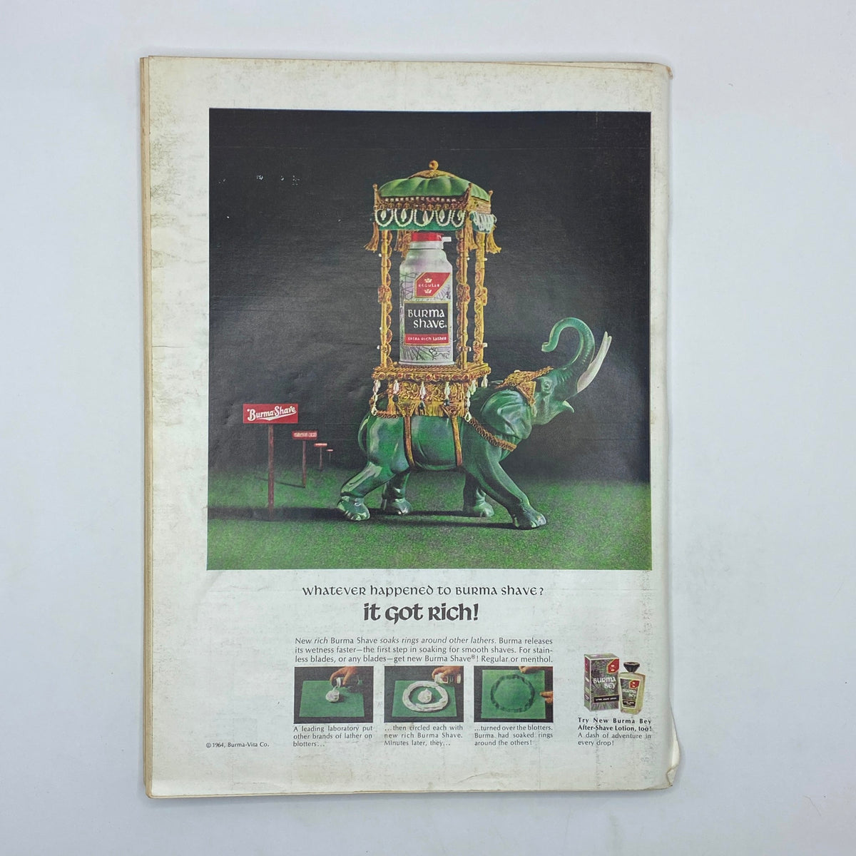 Advertisment on the back cover of The New Yorker Complete Magazine May 16, 1964, featuring a colorful illustration of an elephant promoting Burma Shave.