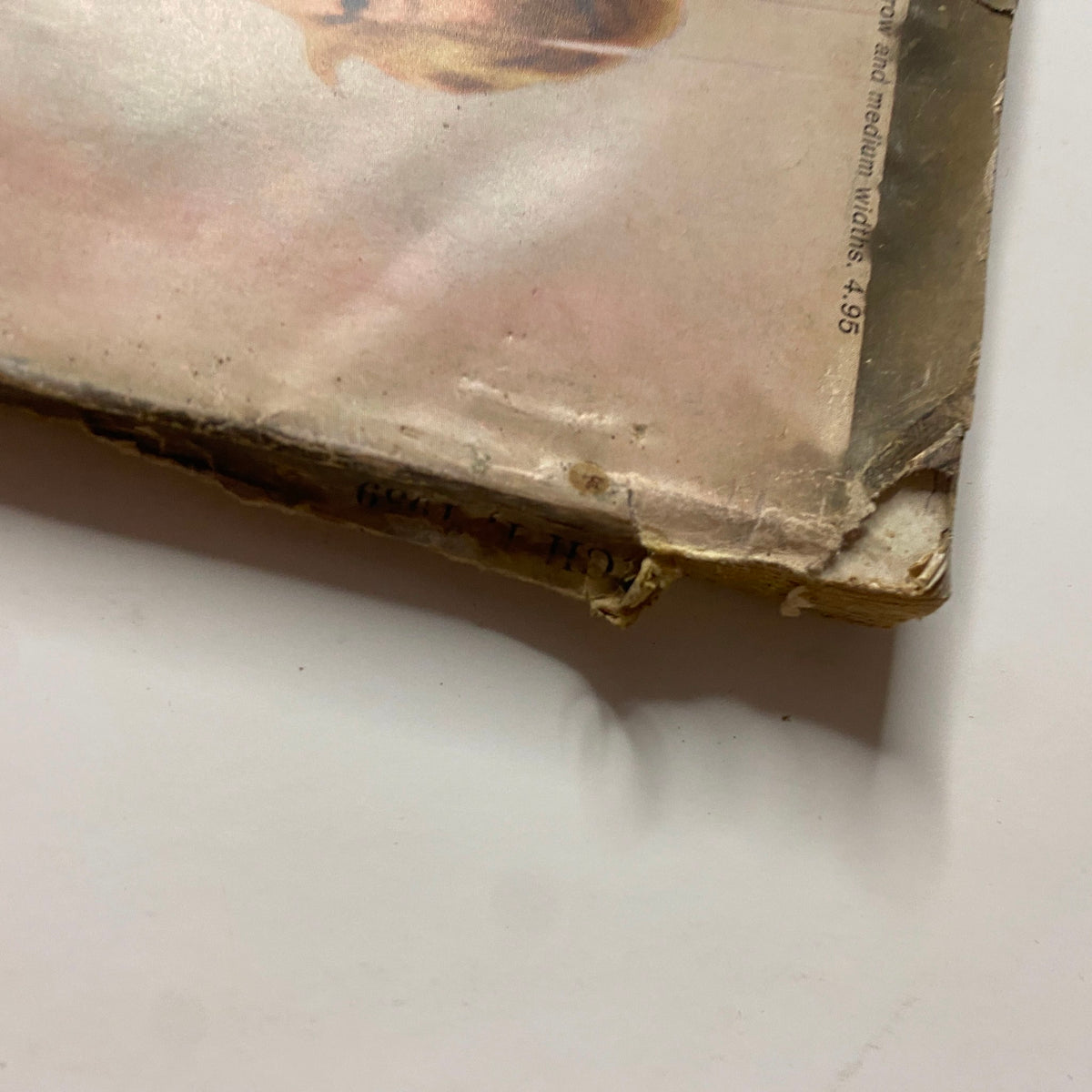 Vogue Magazine March 1, 1959 showing the damage on the cover, featuring wear and tear typical of vintage magazines, indicating its historical value.