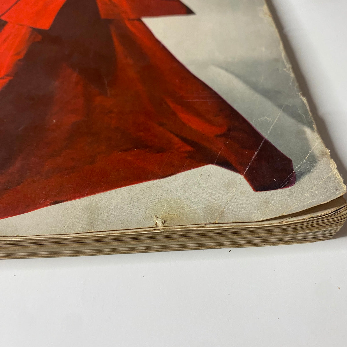 Spine detail of Vogue Magazine November 1, 1946, showing paper aging and wear on the cover. This condition reflects the vintage authenticity of the magazine.