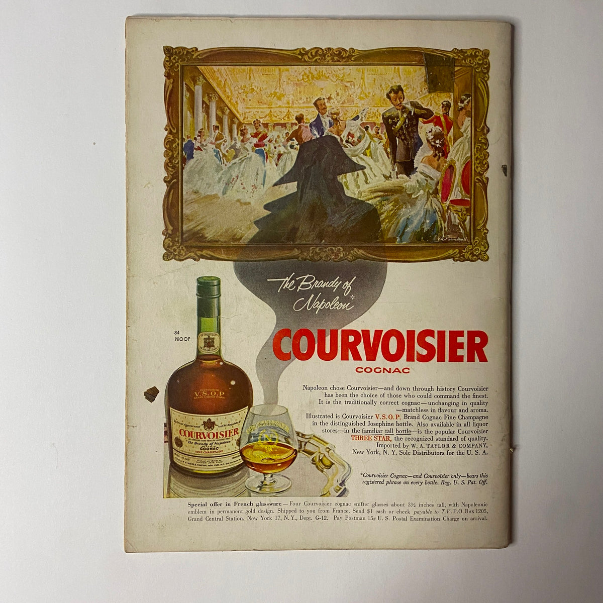 Back cover of Gourmet Magazine, December 1954, showcasing an advertisement for Courvoisier Cognac, with an elegant illustration of a glamorous ballroom scene.