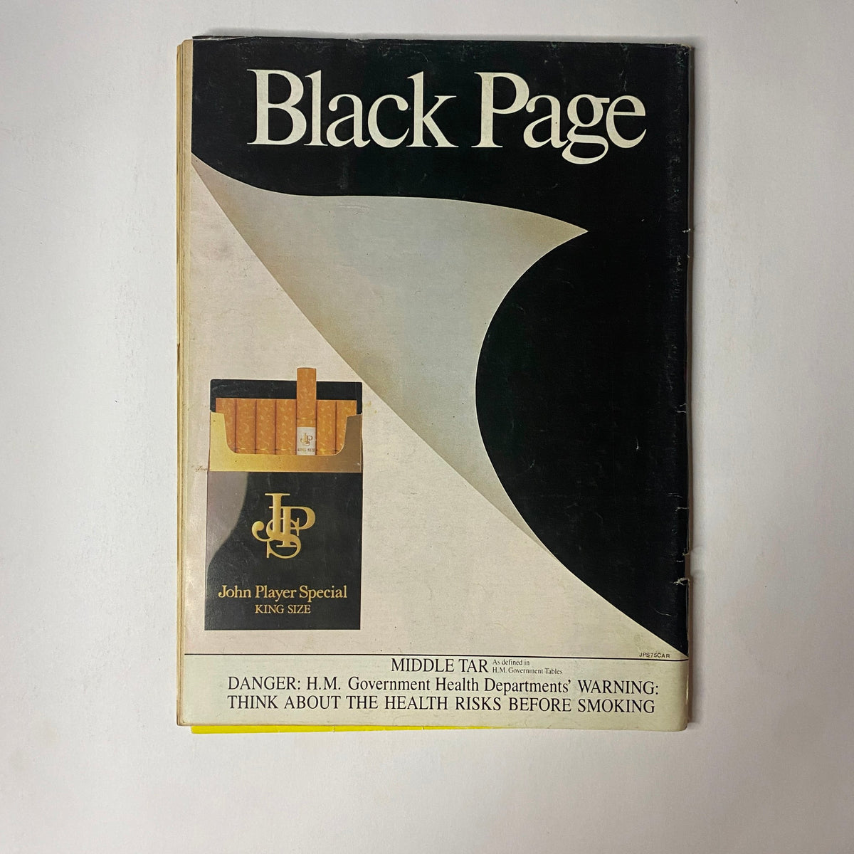 Black page advertisement from an old magazine, warning about health risks of smoking cigarettes, underscoring content diversity within the June 1982 Car Magazine UK Import.
