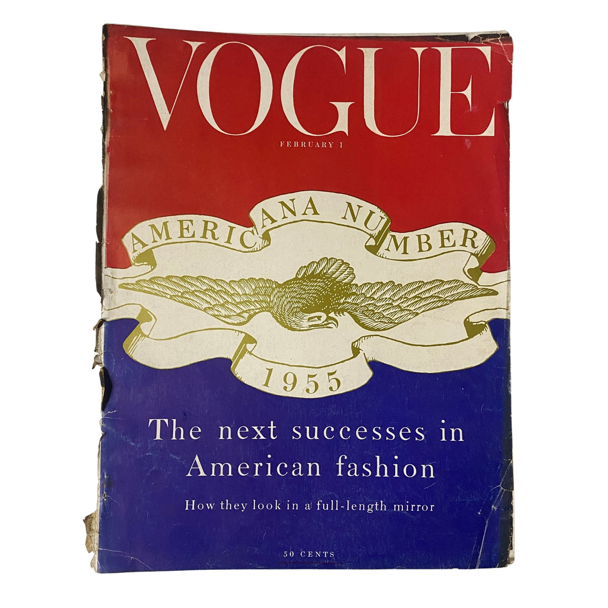 Vogue Magazine February 1, 1955 Americana Number 1955 cover featuring a bold red background with white text and an eagle emblem, showcasing vintage American fashion.