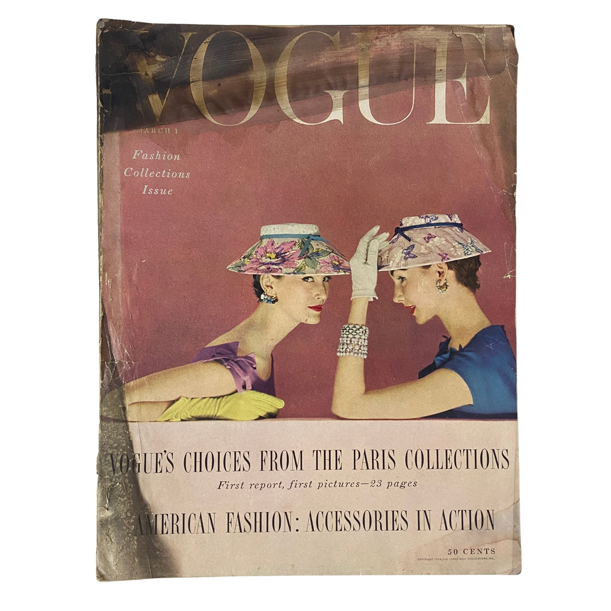 Cover of Vogue Magazine March 1, 1954 featuring Mary Jane Russell and Cherry Nelms showcasing Paris fashion collections. The cover highlights American fashion accessories and is in acceptable vintage condition.
