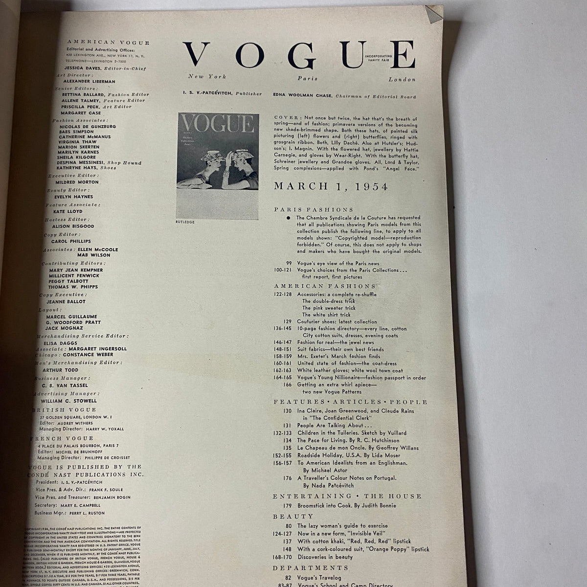 Interior page of Vogue Magazine March 1, 1954 revealing the table of contents, including fashion articles and features focused on Paris collections and American fashion trends.