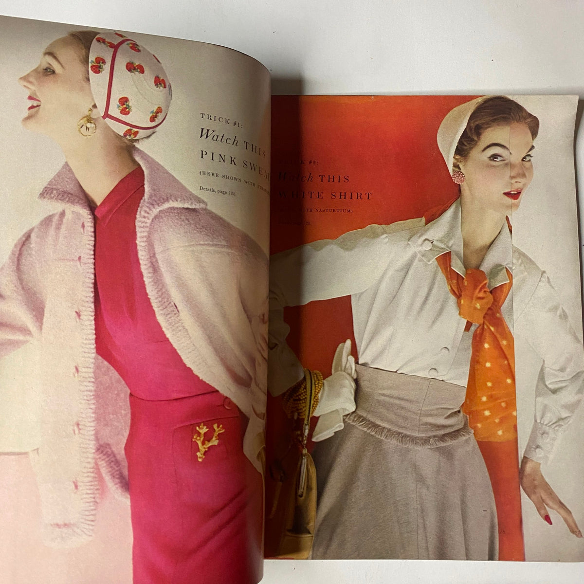 Vogue Magazine March 1, 1954 presenting a vibrant fashion spread featuring a pink sweater and a white shirt, showcasing stylish accessories and elegant design elements.