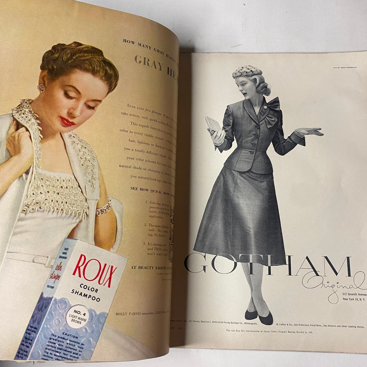 Interior page from Vogue Magazine January 1952 showcasing a gothic-inspired fashion advertisement for Gotham, indicative of the era's stylistic trends.