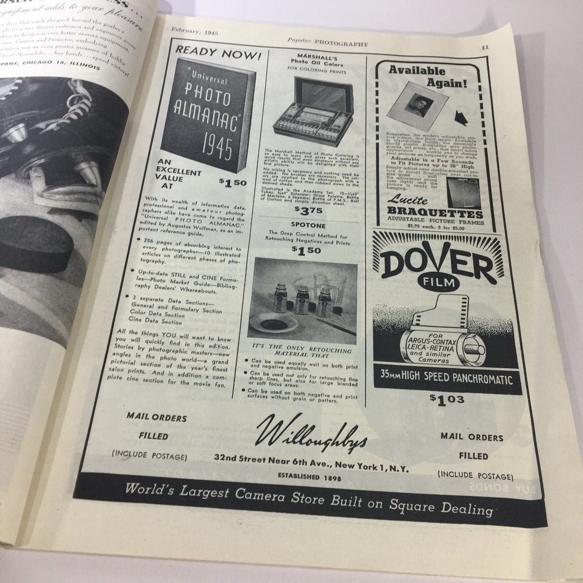 Advertisement page in Popular Photography Magazine February 1945, featuring the Universal Photo Almanac and various photography products.