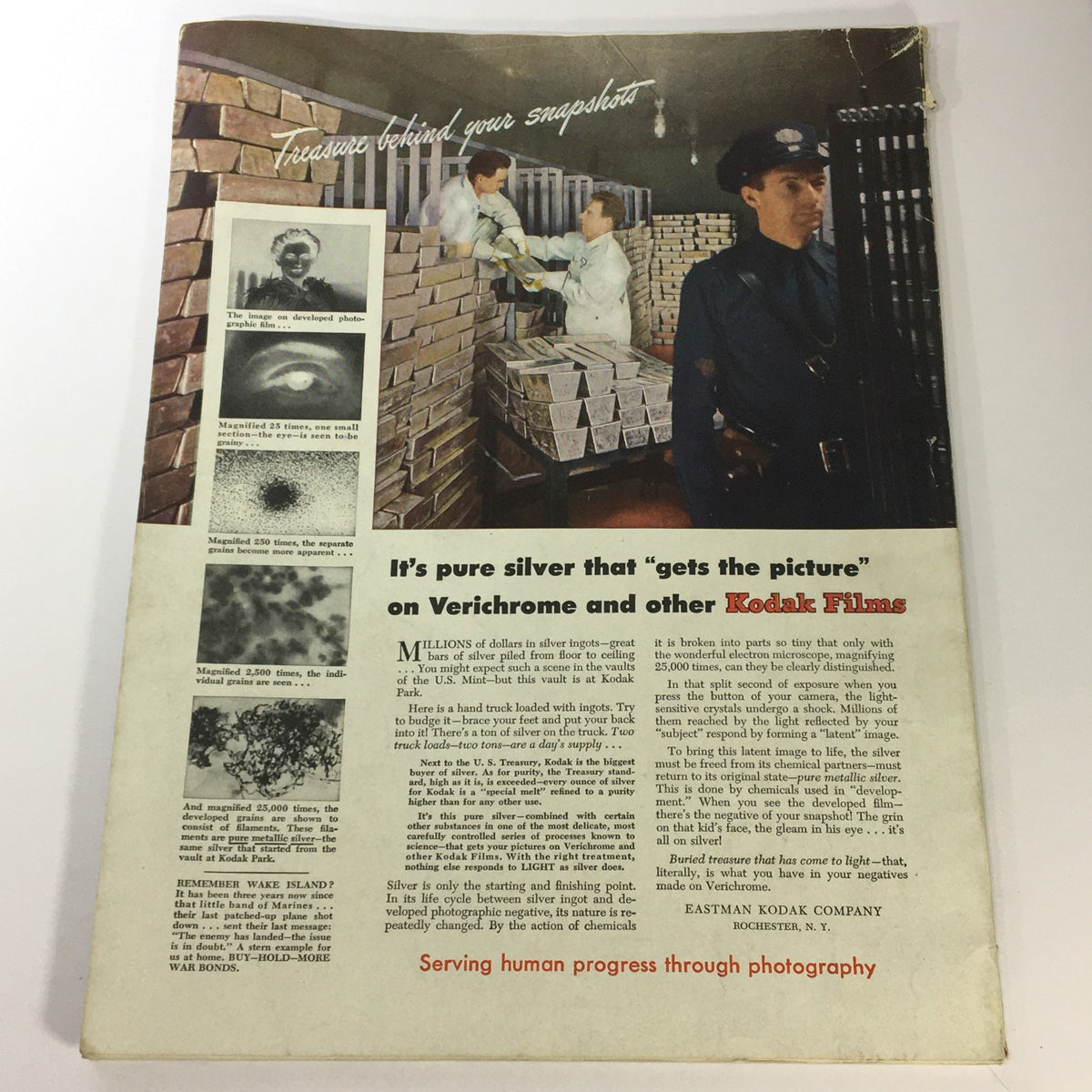 Back cover of VTG Popular Photography Magazine February 1945 featuring an advertisement for Kodak Films. It showcases images related to photo development and the use of silver in film processing, along with a visual of workers handling film rolls in a storage facility. The text highlights the importance of silver in photography and promotes Kodak products, serving as a historical reminder of photography techniques during that era.
