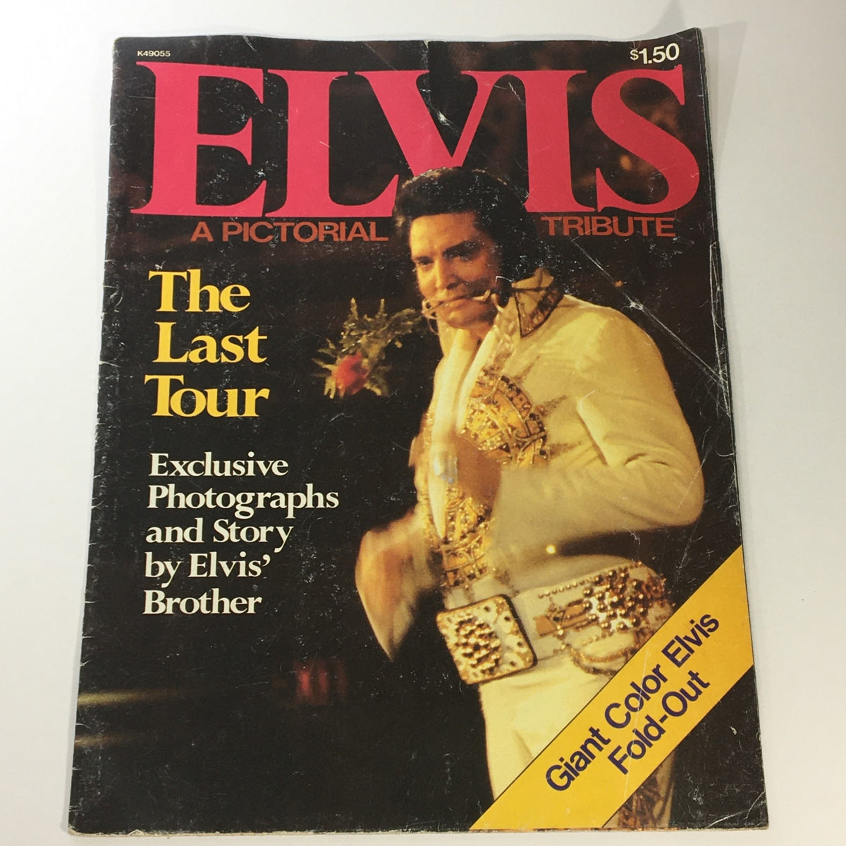 Vintage 1977 Elvis Presley magazine cover titled 'A Pictorial Tribute: The Last Tour', showcasing an image of Elvis in a gold and white outfit, holding a flower, highlighting exclusive photographs from his last tour.