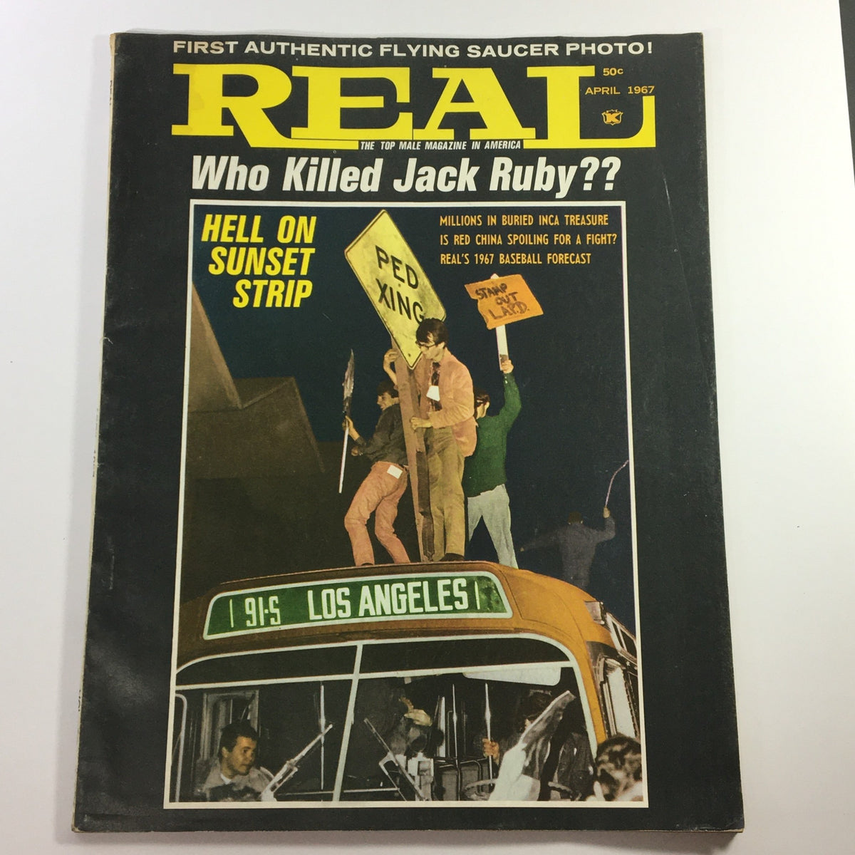 Cover of VTG Real Men Magazine April 1967 titled 'Who Killed Jack Ruby??' featuring a scene of protest on Sunset Strip and bold headlines, capturing the essence of 1960s American culture and historical events.