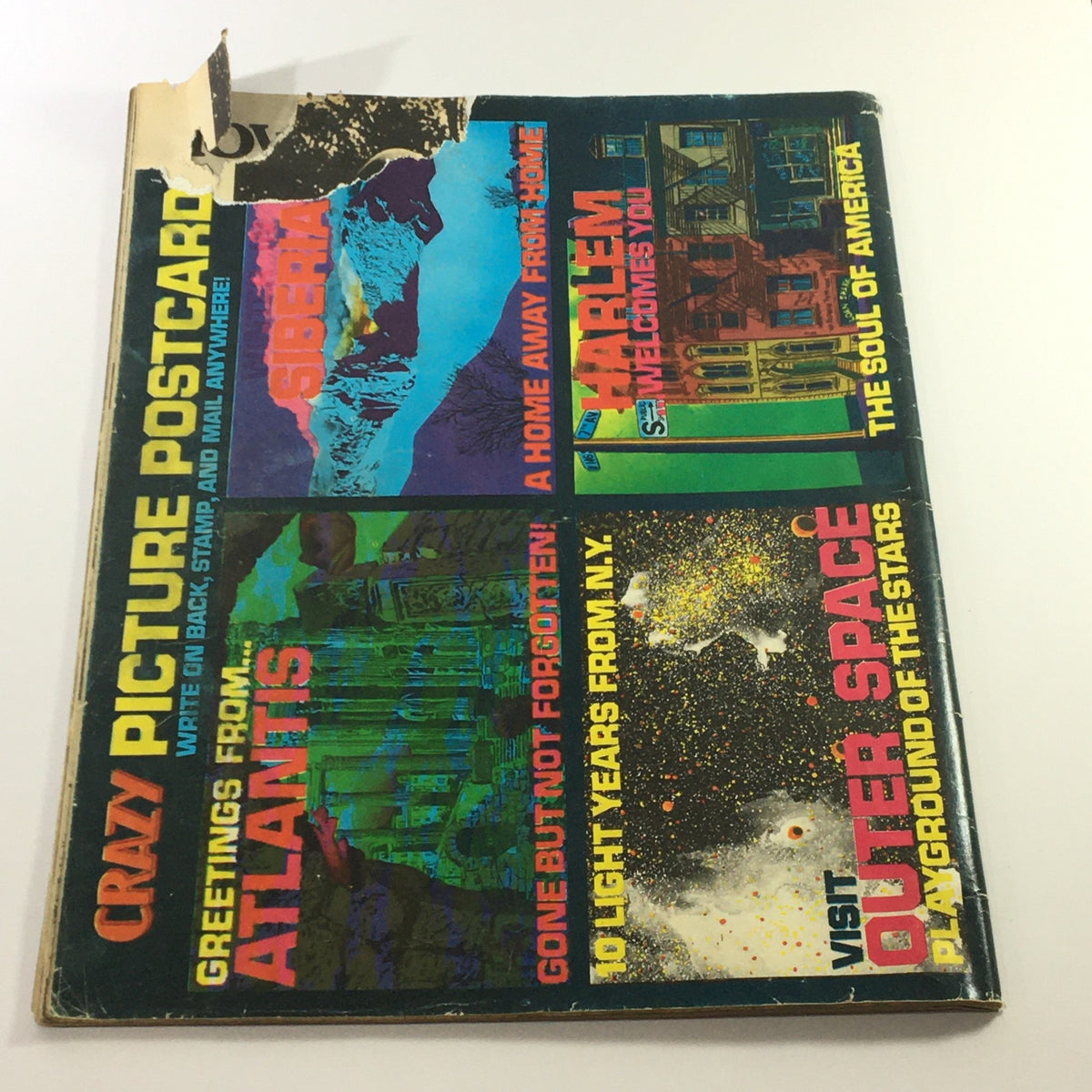 Back cover of the January 1977 issue of Stan Lee's Crazy Magazine, #22, displaying colorful graphics and whimsical text related to postcard greetings.