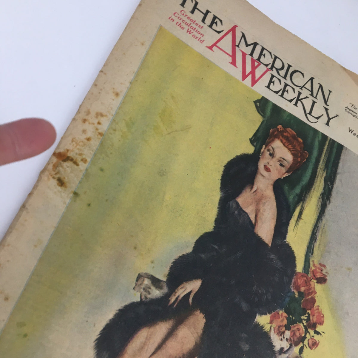 Focused view of the cover of The American Weekly Magazine, June 8, 1947, displaying the title and a detailed image of a woman in a glamorous pose along with elements of the artistic design by David Wright.