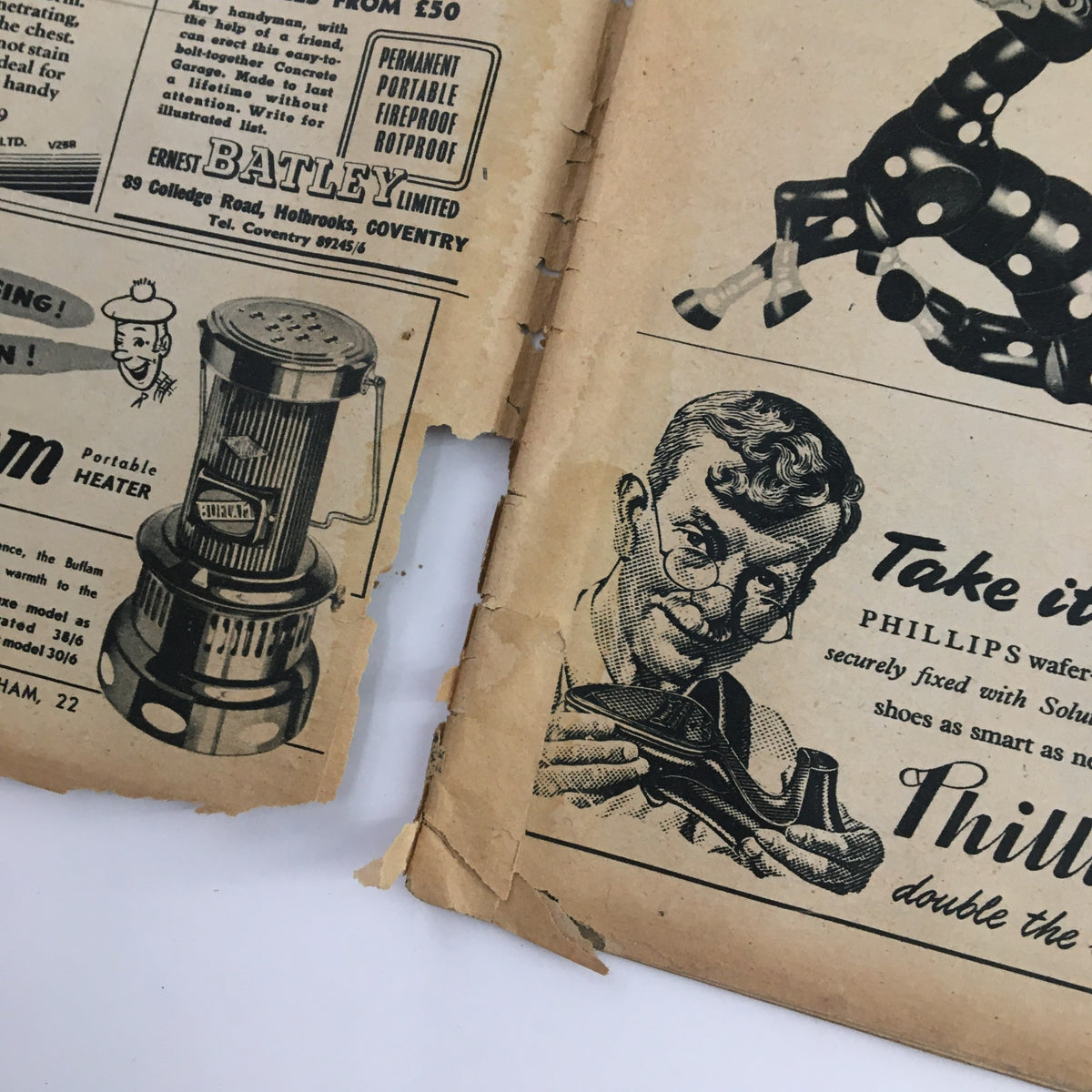 Another interior page of the VTG Illustrated Magazine November 20, 1948, titled 'Man and Superman', featuring old advertisements and visible wear and tear, indicative of its vintage nature.