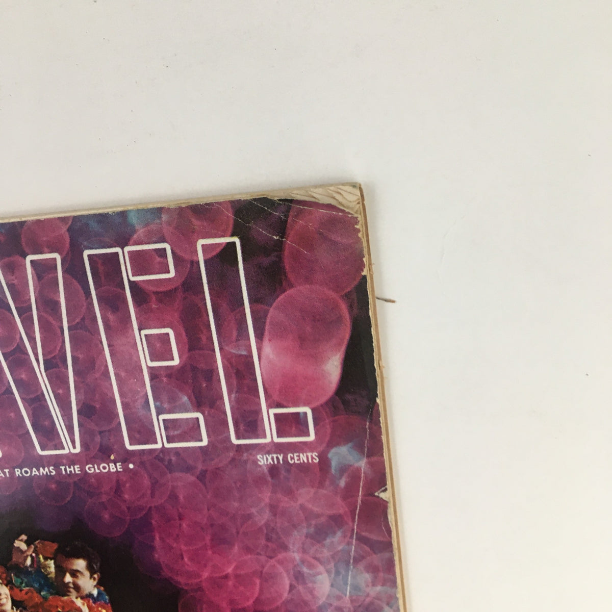 Close-up of the VTG Travel Magazine January 1966 title, highlighting 'The Magazine That Roams the Globe' and its vintage aesthetic.