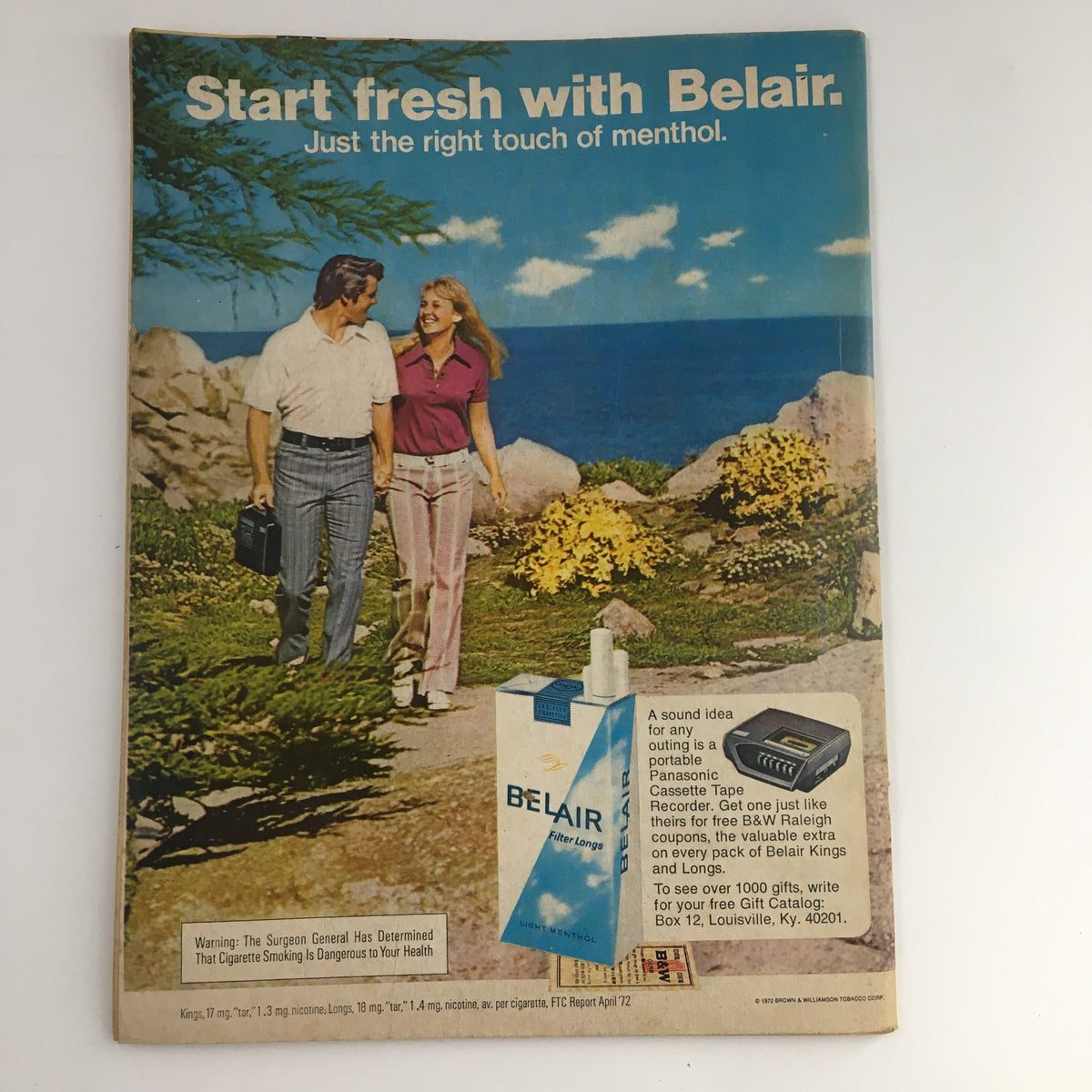 Back cover of Silver Screen Magazine November 1972 featuring an advertisement for Belair cigarettes with a couple outdoors.