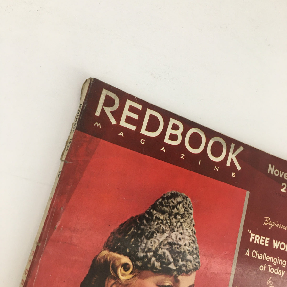 Close-up of the VTG Redbook Magazine November 1936 cover highlighting the title and the woman's fashion details, reflecting the era's style.