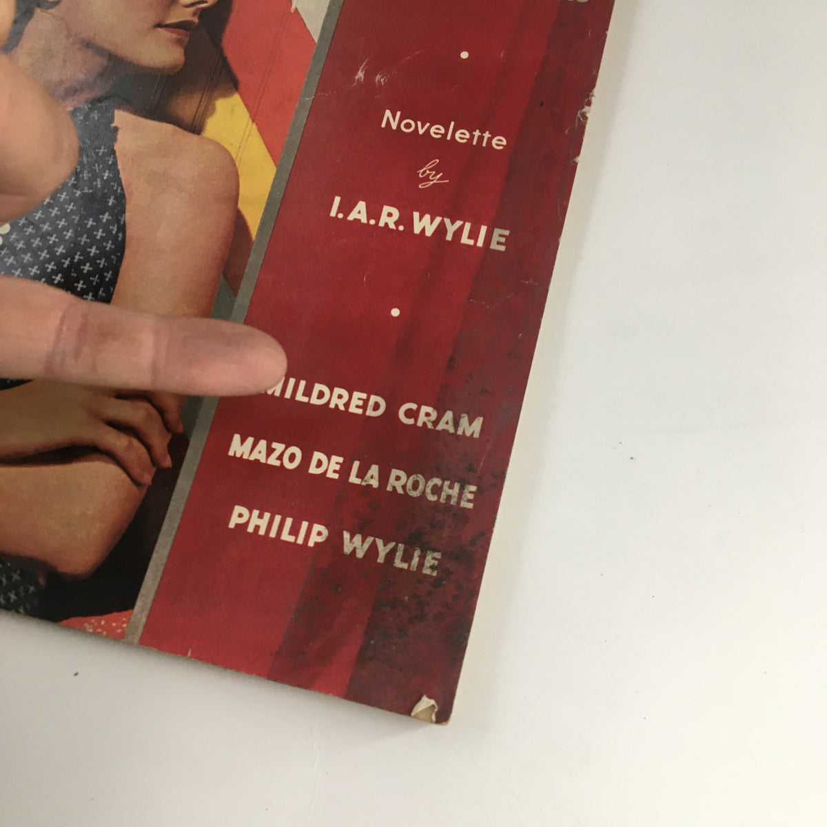 Close-up of the VTG Redbook Magazine August 1936 cover, highlighting the novelette and authors listed, including I.A.R. Wylie, Mildred Cram, Mazo de la Roche, and Philip Wylie.