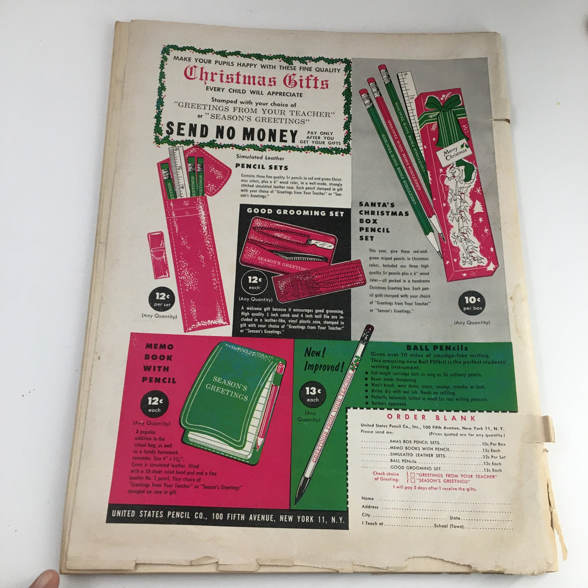 Back cover advertisement of The Instructor Magazine November 1958 featuring Christmas gift ideas, including pencil sets and memo book with pencil, positioned against a vintage design celebrating the magazine's historical context.