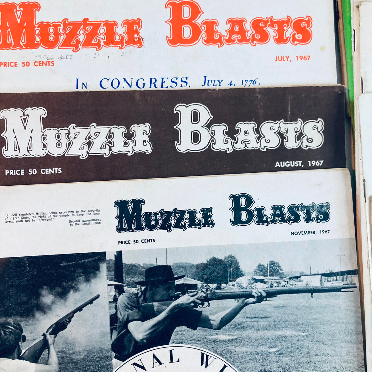 Lot of 21 Muzzle Blasts Magazines depicting July and August 1967 covers, highlighting the art of black powder shooting and historical insights.