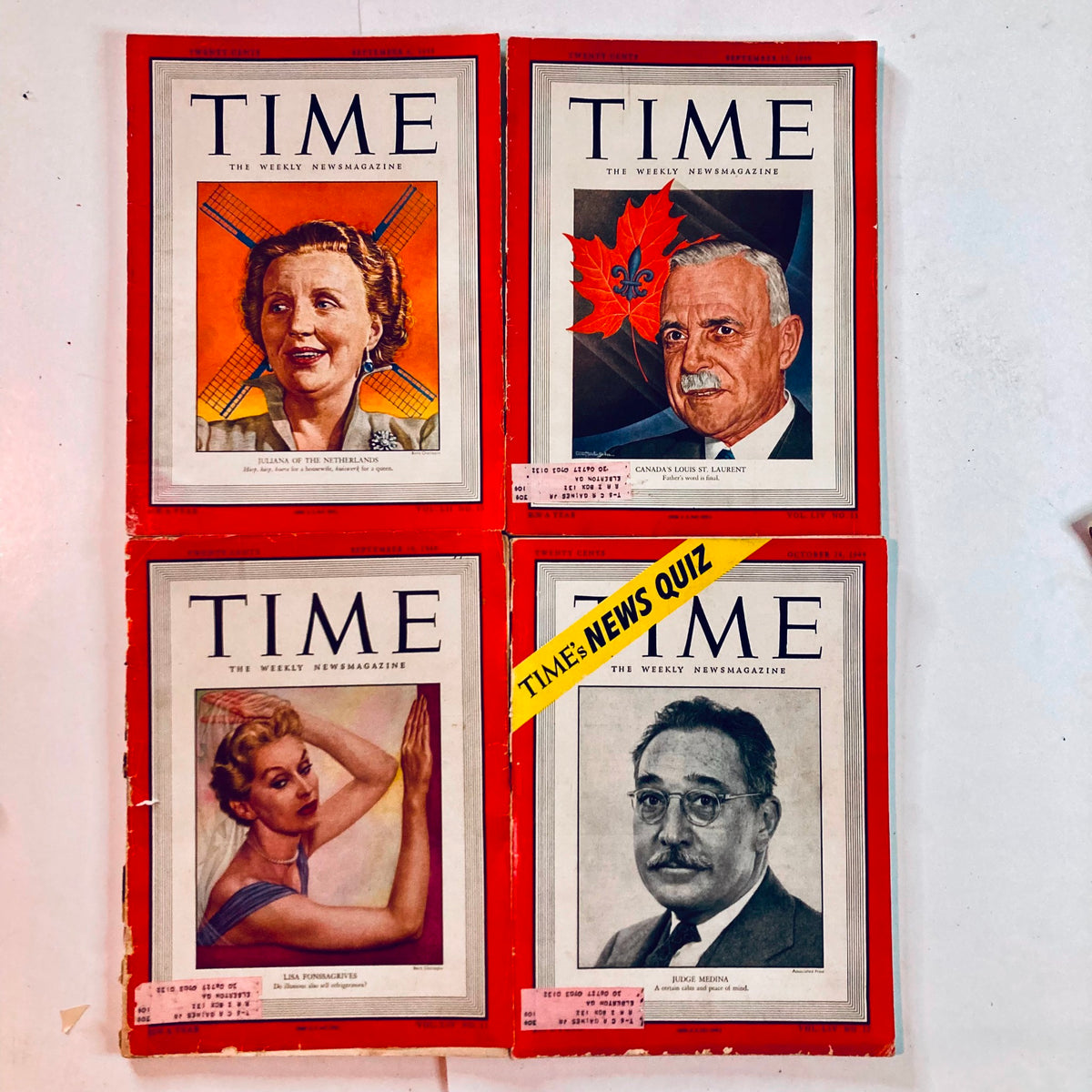 Collection of vintage Time Magazine covers featuring Juliana of the Netherlands and Canadian Prime Minister Louis St. Laurent from the 1940s and 1950s.