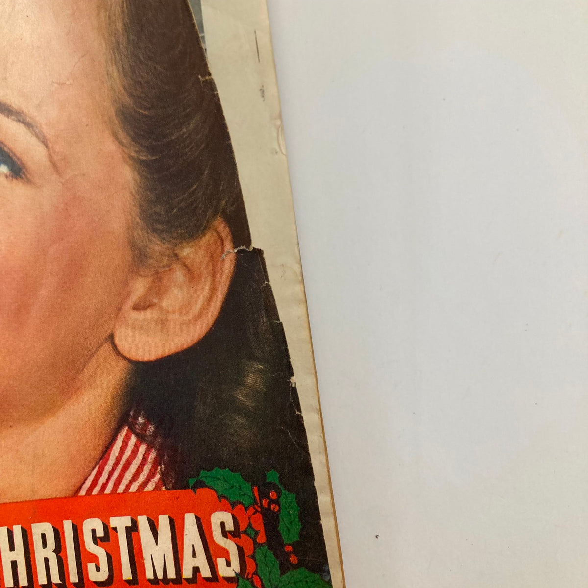 Close-up of the cover of VTG True Story Magazine January 1944, highlighting a woman's ear and hair, with the caption 'Soldier for Christmas'.